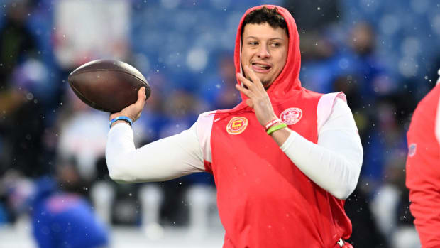 Patrick Mahomes throws the ball in warm ups